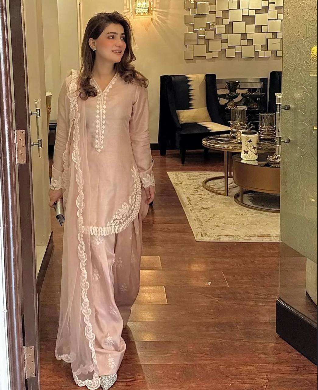 A Vision of Confidence in a Stylish Pink Suit - Image 5