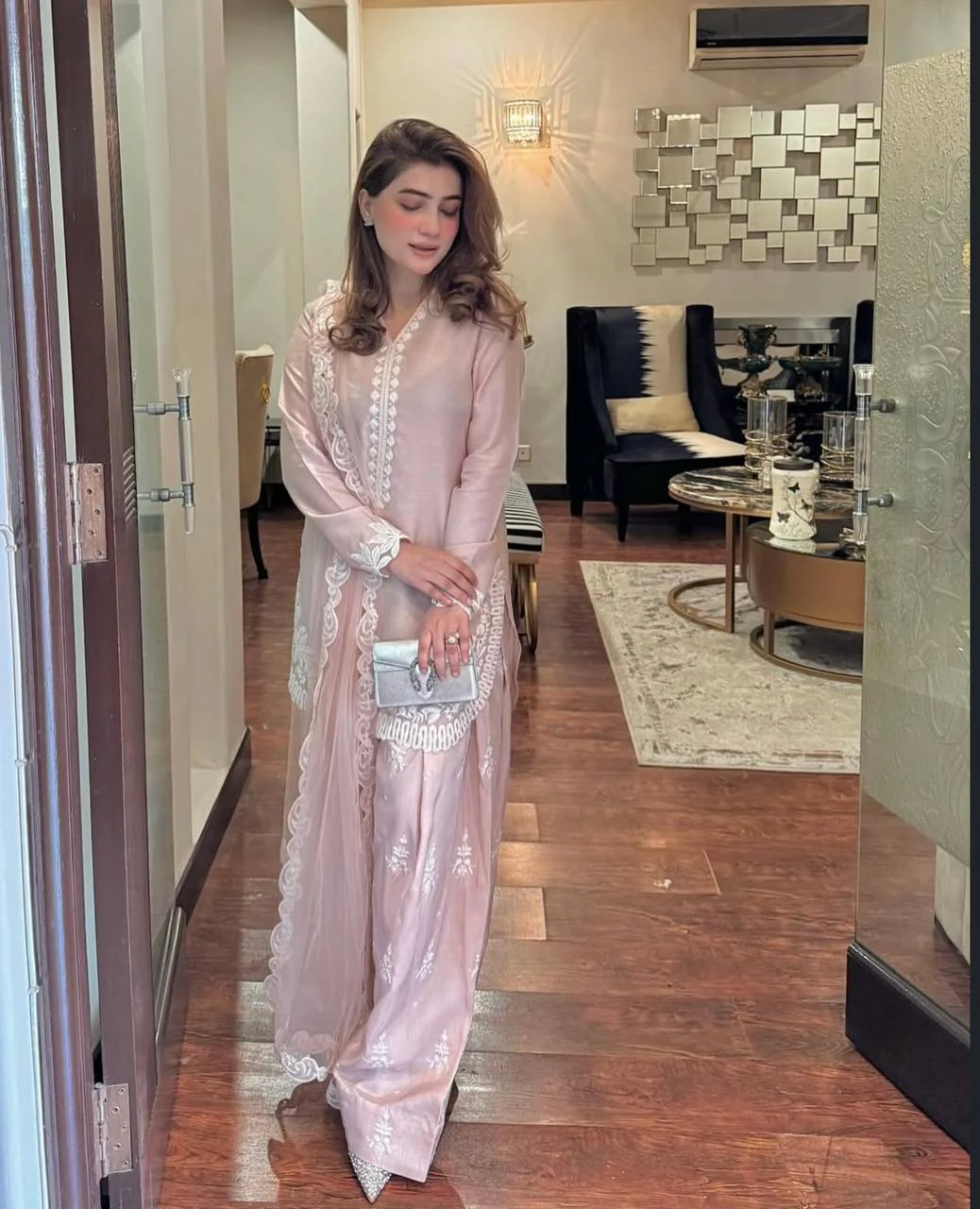 A Vision of Confidence in a Stylish Pink Suit - Image 6