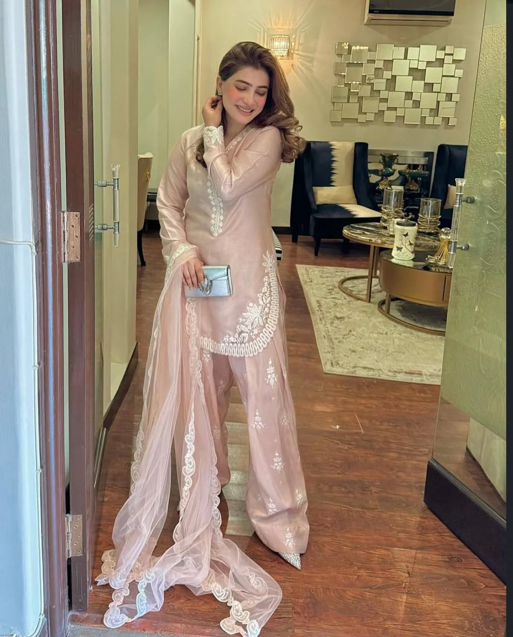 A Vision of Confidence in a Stylish Pink Suit - Image 7