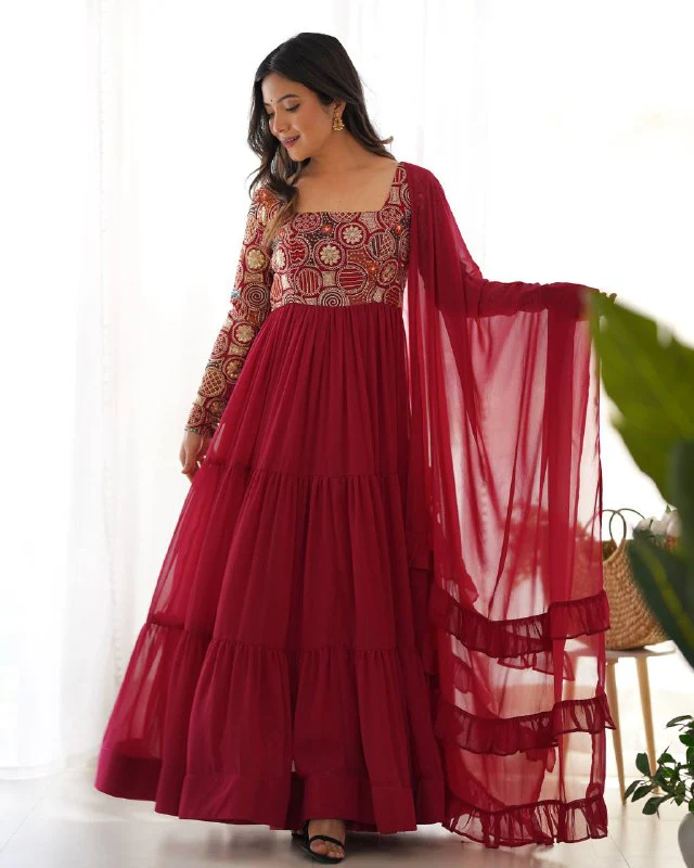 Timeless Beauty in Flowy Red Attire - Image 3