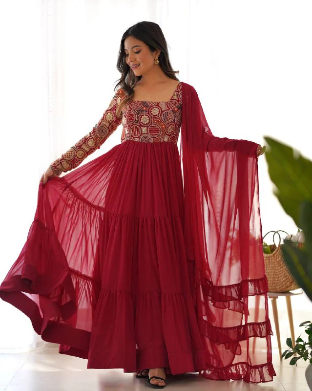 Timeless Beauty in Flowy Red Attire - Image 5