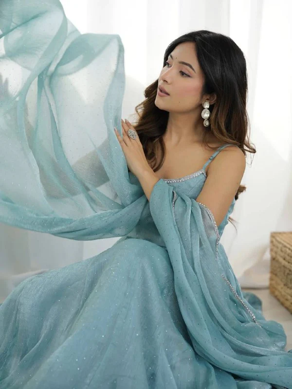 Whispers of Elegance in Soft Fabric - Image 2